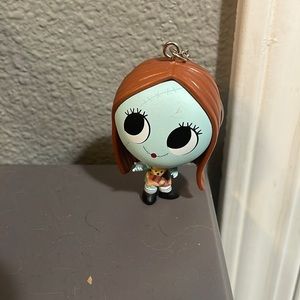 I am selling a nightmare before Christmas sally figure keychain.